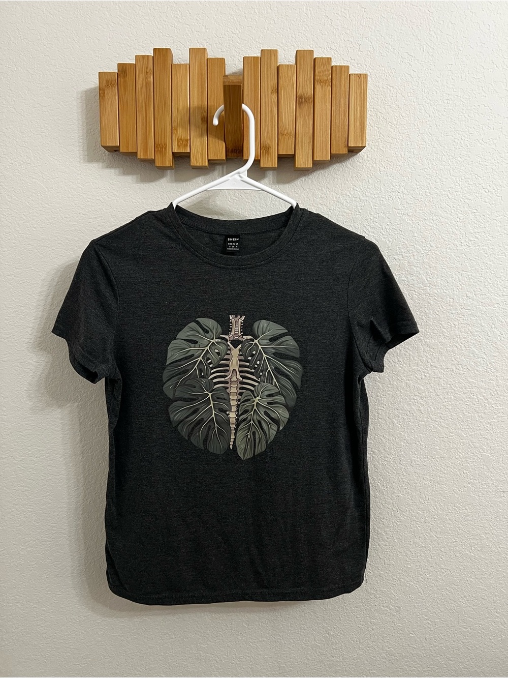 SHEIN Black Short-Sleeve Tee with Green Leaf Spine Graphic